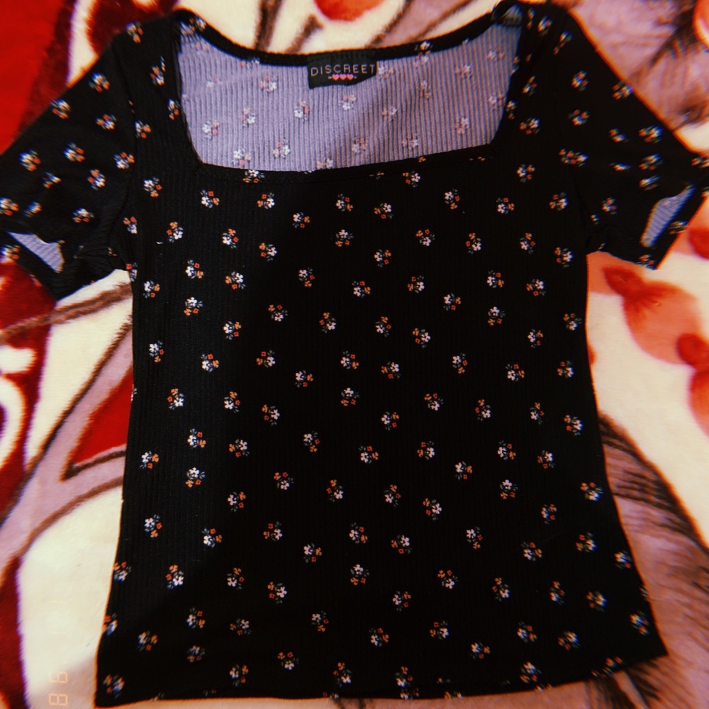 floral black top.